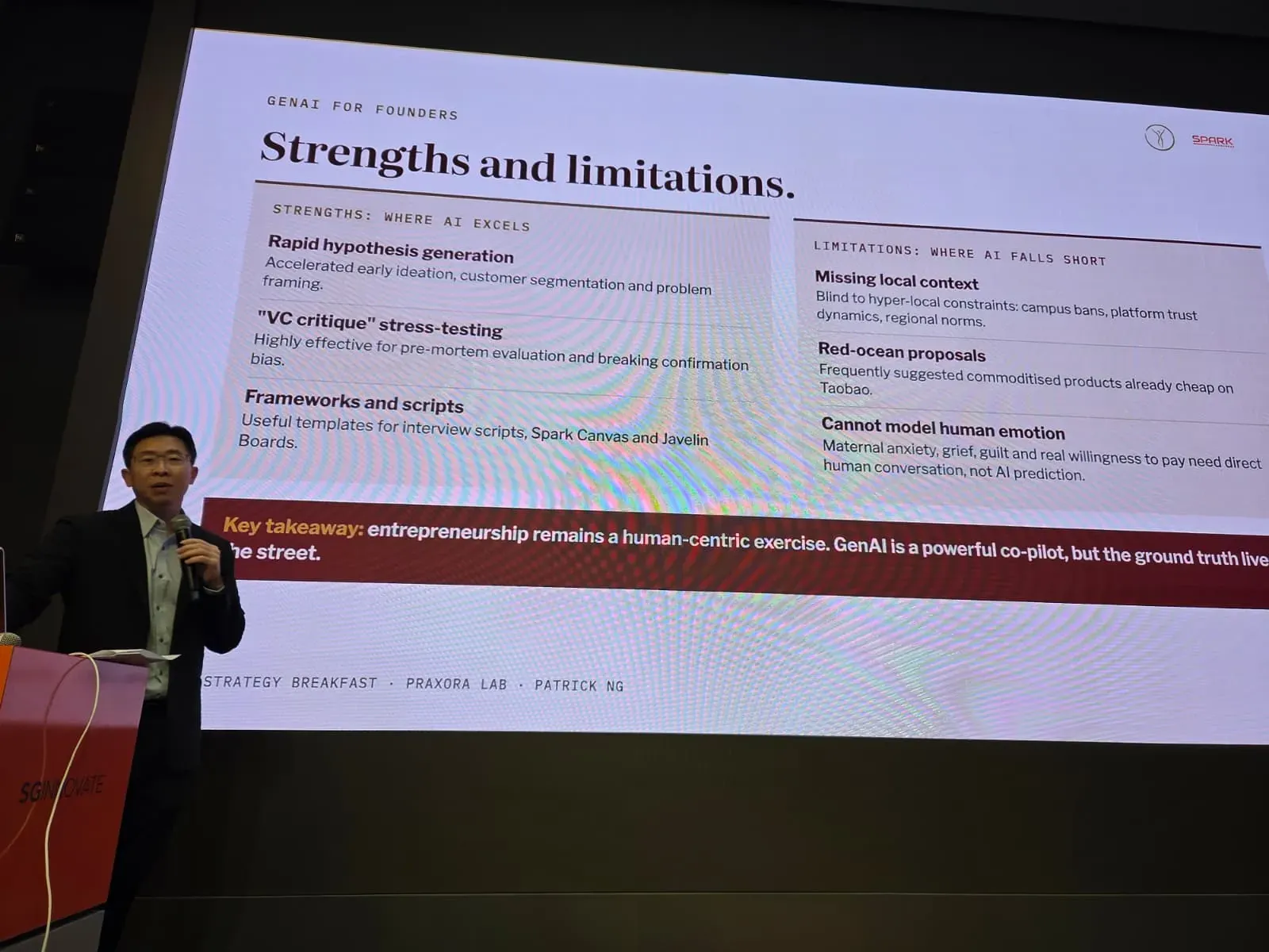 Patrick Ng speaking beside a slide titled Strengths and limitations, comparing where generative AI excels for founders and where it falls short.